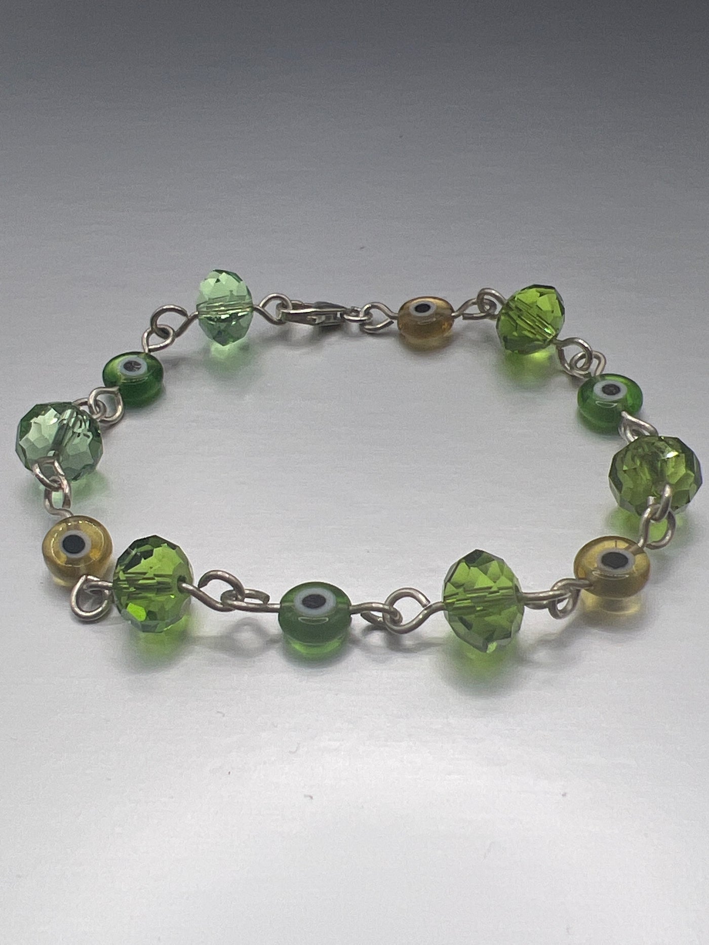 Green Swarovski and Glass evil eye Bracelet
